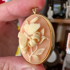 Vintage Trifari brand pendant featuring a butterfly